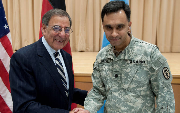 Jan 2020 - Serving the Team, Col. Mohammad Naeem, MD, FACR, shaking hands with Leon E. Panetta