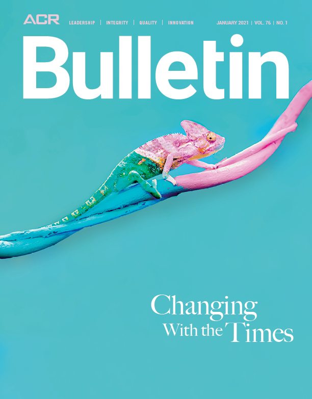 Jan Bulletin cover, photo of a chameleon, Changing with the times