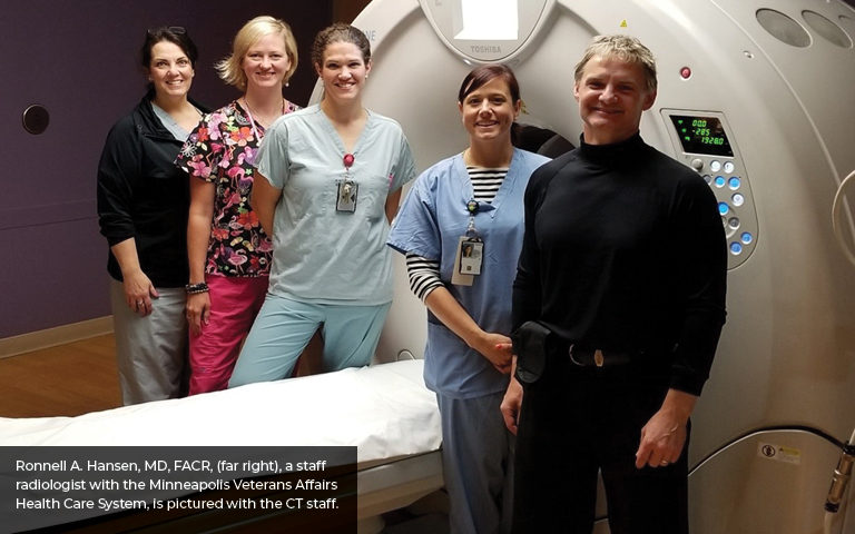 Photo: Ronnell A. Hansen, MD, FACR, (far right), a staff radiologist with the Minneapolis Veterans Affairs Health Care System, is pictured with the CT staff.  