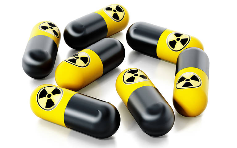 illustration of pills with nuclear logo