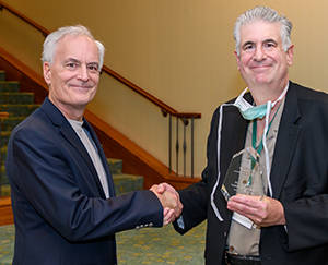 Photo: Frank Lexa presents award to Ian Weissman