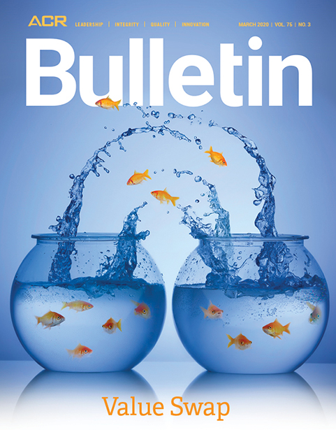March 2020 cover - goldfish jumping, blue water