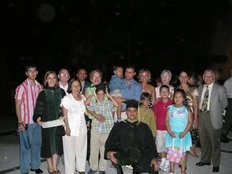 Efren Flores, MD, and family after his medical school graduation