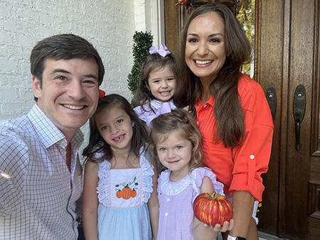 Nilda Maria Williams, MD, MS with her husband and three daughters