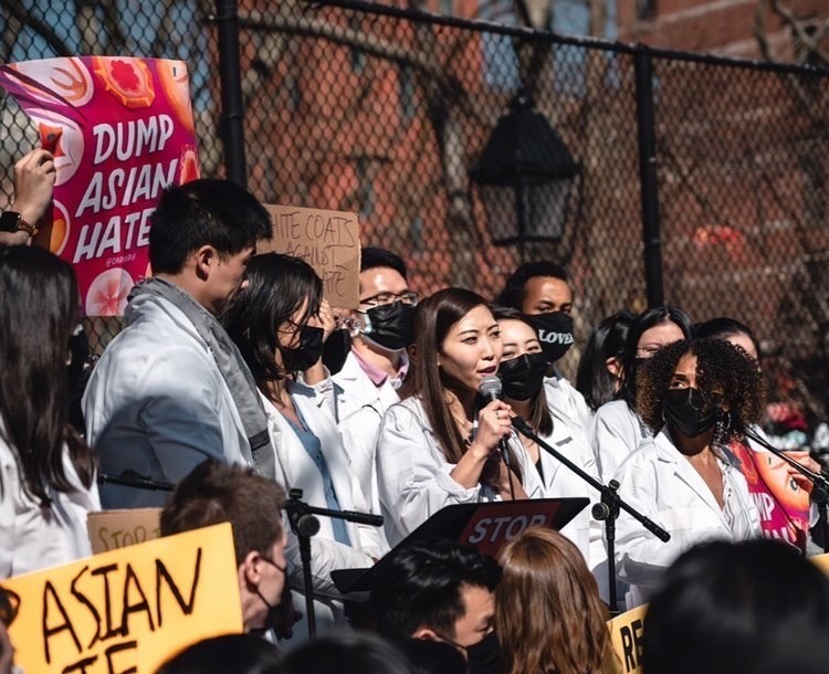 Michelle Lee, MD, speaks to the crowd at the Asian American and Pacific Islander Rally Against Hate